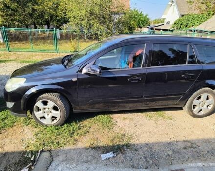 Черный Опель Астра, объемом двигателя 1.7 л и пробегом 240 тыс. км за 4999 $, фото 4 на Automoto.ua