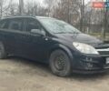 Черный Опель Астра, объемом двигателя 1.6 л и пробегом 280 тыс. км за 5100 $, фото 1 на Automoto.ua