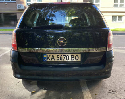 Черный Опель Астра, объемом двигателя 1.8 л и пробегом 145 тыс. км за 5900 $, фото 4 на Automoto.ua