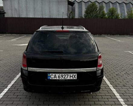 Черный Опель Астра, объемом двигателя 1.8 л и пробегом 405 тыс. км за 5500 $, фото 7 на Automoto.ua