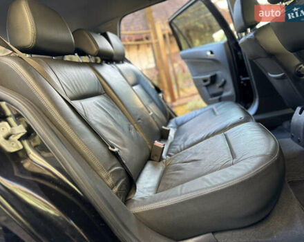 Черный Опель Астра, объемом двигателя 1.6 л и пробегом 180 тыс. км за 5499 $, фото 165 на Automoto.ua