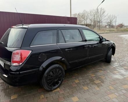 Черный Опель Астра, объемом двигателя 1.7 л и пробегом 240 тыс. км за 2800 $, фото 6 на Automoto.ua