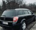 Черный Опель Астра, объемом двигателя 1.9 л и пробегом 262 тыс. км за 5500 $, фото 2 на Automoto.ua