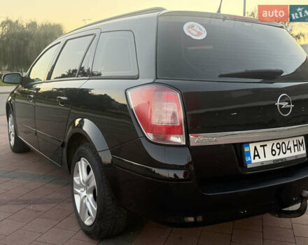 Черный Опель Астра, объемом двигателя 1.69 л и пробегом 260 тыс. км за 5550 $, фото 14 на Automoto.ua