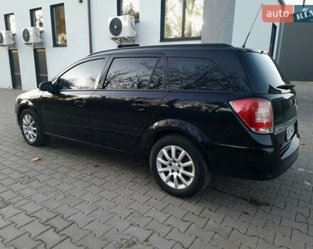 Черный Опель Астра, объемом двигателя 1.6 л и пробегом 327 тыс. км за 4400 $, фото 8 на Automoto.ua