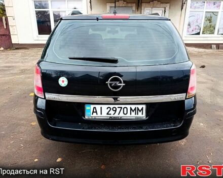Черный Опель Астра, объемом двигателя 1.7 л и пробегом 300 тыс. км за 5250 $, фото 4 на Automoto.ua