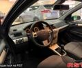 Черный Опель Астра, объемом двигателя 1.4 л и пробегом 210 тыс. км за 5600 $, фото 9 на Automoto.ua