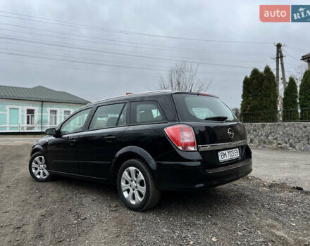 Черный Опель Астра, объемом двигателя 1.8 л и пробегом 209 тыс. км за 5600 $, фото 3 на Automoto.ua