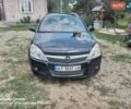 Черный Опель Астра, объемом двигателя 1.25 л и пробегом 330 тыс. км за 4900 $, фото 1 на Automoto.ua