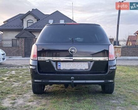 Черный Опель Астра, объемом двигателя 1.8 л и пробегом 177 тыс. км за 5199 $, фото 5 на Automoto.ua