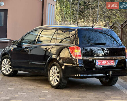 Черный Опель Астра, объемом двигателя 1.6 л и пробегом 180 тыс. км за 5499 $, фото 41 на Automoto.ua
