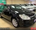 Черный Опель Астра, объемом двигателя 1.4 л и пробегом 210 тыс. км за 5600 $, фото 1 на Automoto.ua