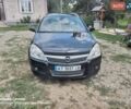 Черный Опель Астра, объемом двигателя 1.25 л и пробегом 330 тыс. км за 4900 $, фото 1 на Automoto.ua