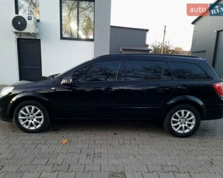 Черный Опель Астра, объемом двигателя 1.6 л и пробегом 327 тыс. км за 4400 $, фото 5 на Automoto.ua