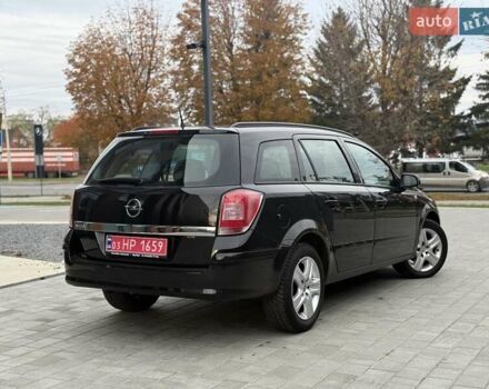 Чорний Опель Астра, об'ємом двигуна 1.6 л та пробігом 241 тис. км за 5499 $, фото 5 на Automoto.ua
