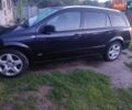 Черный Опель Астра, объемом двигателя 1.8 л и пробегом 275 тыс. км за 7000 $, фото 1 на Automoto.ua