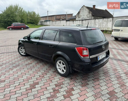 Черный Опель Астра, объемом двигателя 1.36 л и пробегом 213 тыс. км за 3900 $, фото 6 на Automoto.ua