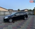 Черный Опель Астра, объемом двигателя 1.6 л и пробегом 240 тыс. км за 5900 $, фото 1 на Automoto.ua