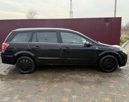 Черный Опель Астра, объемом двигателя 1.7 л и пробегом 240 тыс. км за 2800 $, фото 7 на Automoto.ua