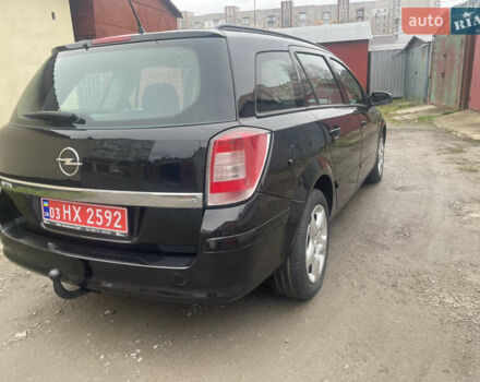 Черный Опель Астра, объемом двигателя 1.6 л и пробегом 206 тыс. км за 4900 $, фото 4 на Automoto.ua