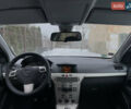 Черный Опель Астра, объемом двигателя 1.6 л и пробегом 192 тыс. км за 5600 $, фото 16 на Automoto.ua