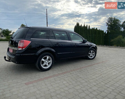 Черный Опель Астра, объемом двигателя 1.6 л и пробегом 224 тыс. км за 5200 $, фото 3 на Automoto.ua