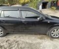 Черный Опель Астра, объемом двигателя 1.6 л и пробегом 267 тыс. км за 5500 $, фото 2 на Automoto.ua