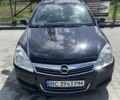 Черный Опель Астра, объемом двигателя 1.6 л и пробегом 163 тыс. км за 5500 $, фото 1 на Automoto.ua