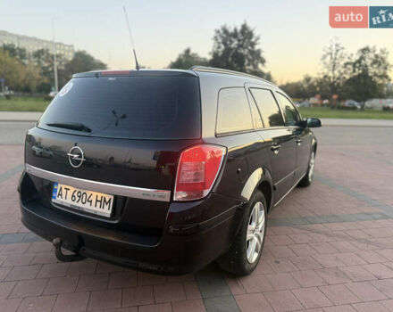 Черный Опель Астра, объемом двигателя 1.69 л и пробегом 260 тыс. км за 5550 $, фото 13 на Automoto.ua