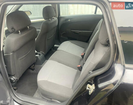 Черный Опель Астра, объемом двигателя 1.6 л и пробегом 206 тыс. км за 4900 $, фото 12 на Automoto.ua