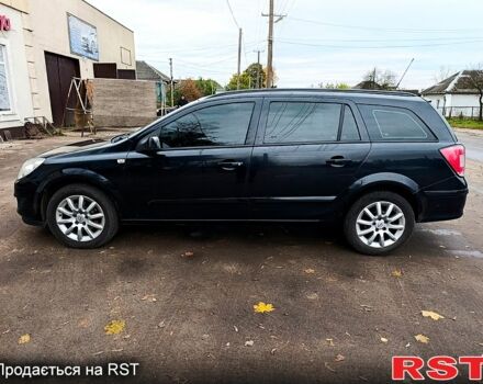 Черный Опель Астра, объемом двигателя 1.7 л и пробегом 300 тыс. км за 5250 $, фото 7 на Automoto.ua