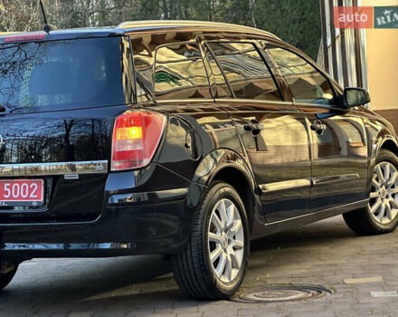 Черный Опель Астра, объемом двигателя 1.6 л и пробегом 180 тыс. км за 5499 $, фото 90 на Automoto.ua