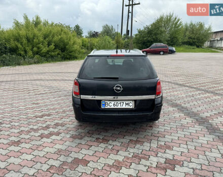 Черный Опель Астра, объемом двигателя 1.36 л и пробегом 213 тыс. км за 3900 $, фото 8 на Automoto.ua