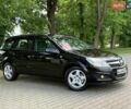 Черный Опель Астра, объемом двигателя 1.6 л и пробегом 206 тыс. км за 5999 $, фото 141 на Automoto.ua