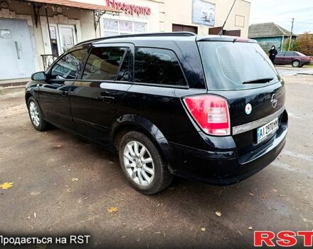 Черный Опель Астра, объемом двигателя 1.7 л и пробегом 300 тыс. км за 5250 $, фото 5 на Automoto.ua