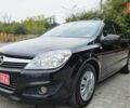 Черный Опель Астра, объемом двигателя 1.6 л и пробегом 209 тыс. км за 5850 $, фото 1 на Automoto.ua