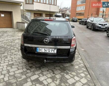 Черный Опель Астра, объемом двигателя 1.7 л и пробегом 276 тыс. км за 5200 $, фото 5 на Automoto.ua