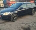 Черный Опель Астра, объемом двигателя 1.6 л и пробегом 230 тыс. км за 4950 $, фото 1 на Automoto.ua