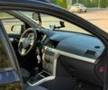 Черный Опель Астра, объемом двигателя 1.7 л и пробегом 276 тыс. км за 5499 $, фото 25 на Automoto.ua