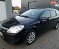 Черный Опель Астра, объемом двигателя 1.6 л и пробегом 327 тыс. км за 4400 $, фото 1 на Automoto.ua