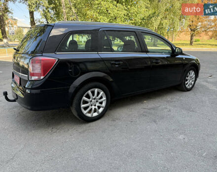 Черный Опель Астра, объемом двигателя 1.6 л и пробегом 219 тыс. км за 6000 $, фото 1 на Automoto.ua