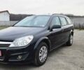 Черный Опель Астра, объемом двигателя 1.6 л и пробегом 210 тыс. км за 5850 $, фото 1 на Automoto.ua