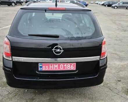 Черный Опель Астра, объемом двигателя 1.6 л и пробегом 210 тыс. км за 5850 $, фото 20 на Automoto.ua