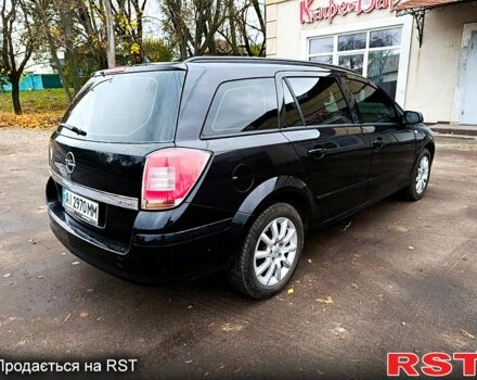 Черный Опель Астра, объемом двигателя 1.7 л и пробегом 300 тыс. км за 5250 $, фото 3 на Automoto.ua