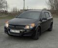 Черный Опель Астра, объемом двигателя 1.6 л и пробегом 365 тыс. км за 4107 $, фото 2 на Automoto.ua