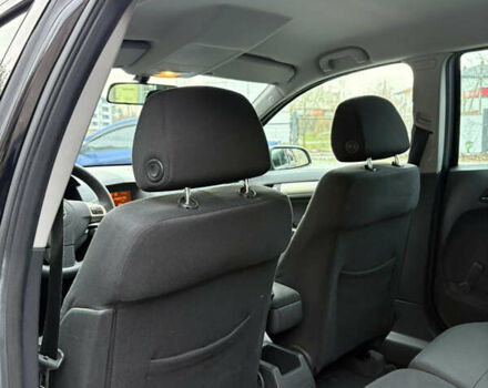 Черный Опель Астра, объемом двигателя 1.6 л и пробегом 208 тыс. км за 5600 $, фото 25 на Automoto.ua