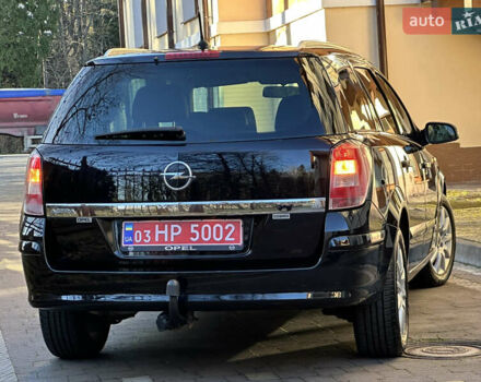 Черный Опель Астра, объемом двигателя 1.6 л и пробегом 180 тыс. км за 5499 $, фото 87 на Automoto.ua