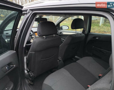 Черный Опель Астра, объемом двигателя 1.6 л и пробегом 189 тыс. км за 4999 $, фото 13 на Automoto.ua