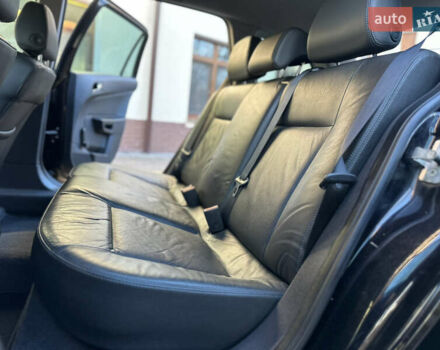 Черный Опель Астра, объемом двигателя 1.6 л и пробегом 180 тыс. км за 5499 $, фото 173 на Automoto.ua