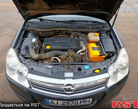 Черный Опель Астра, объемом двигателя 1.7 л и пробегом 300 тыс. км за 5250 $, фото 10 на Automoto.ua